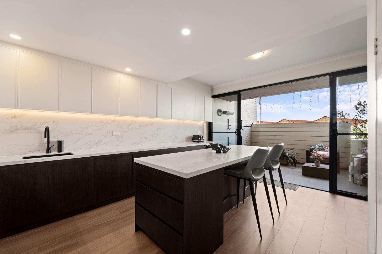 Kitchen with Balcony Access - Coral Kitchen
